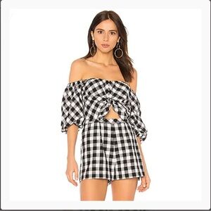 SAYLOR romper with peek a boo tie at midriff. New with tags. Size Medium